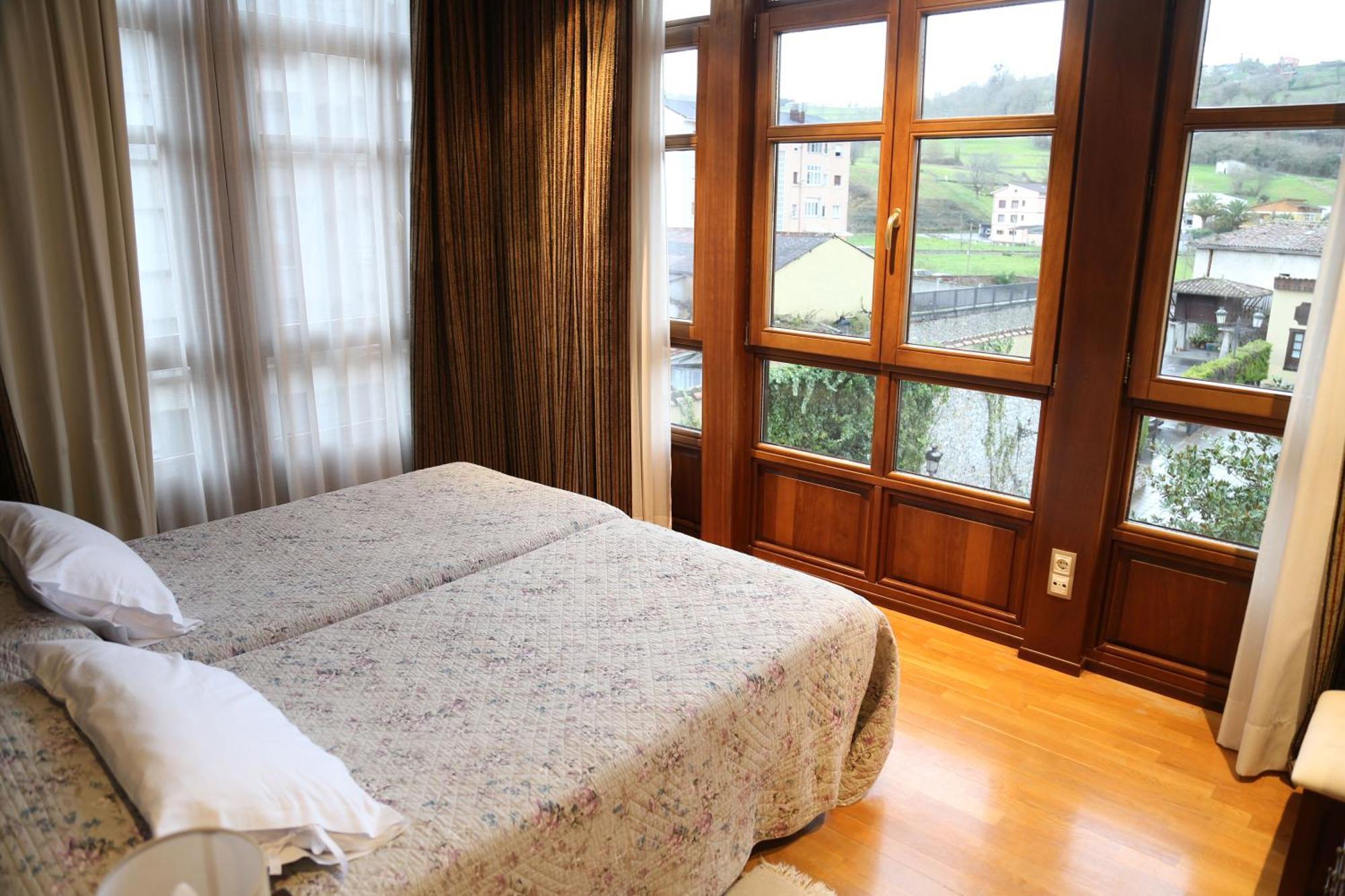 Apartamentos La Pontiga *** อินเฟียสโต ภายนอก รูปภาพ