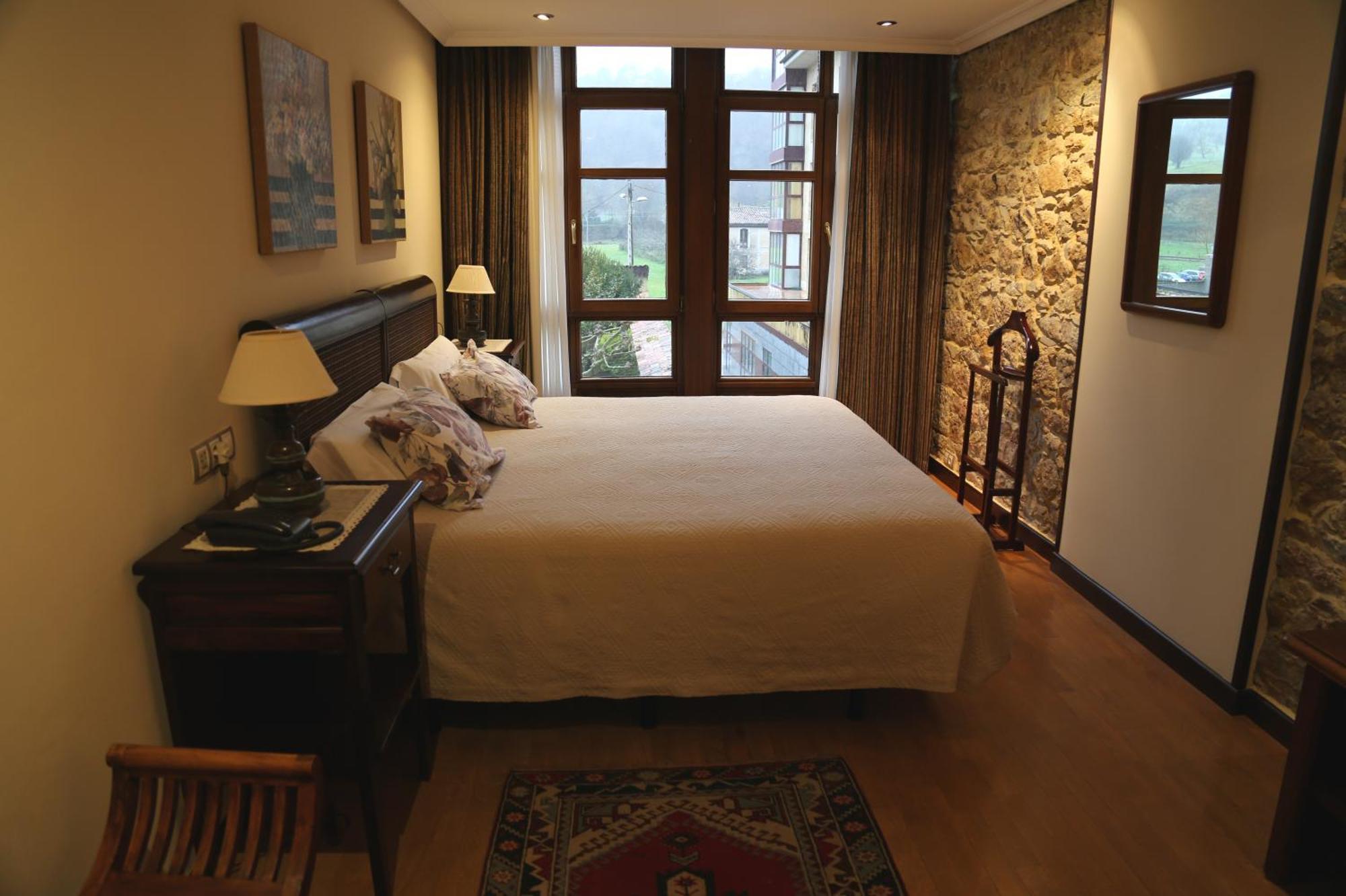 Apartamentos La Pontiga *** อินเฟียสโต ภายนอก รูปภาพ