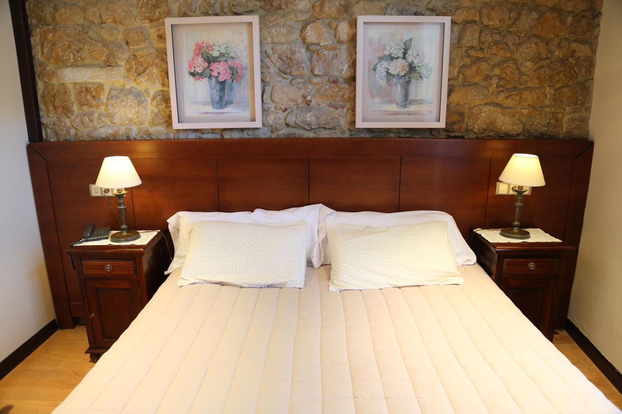 Apartamentos La Pontiga *** อินเฟียสโต ภายนอก รูปภาพ