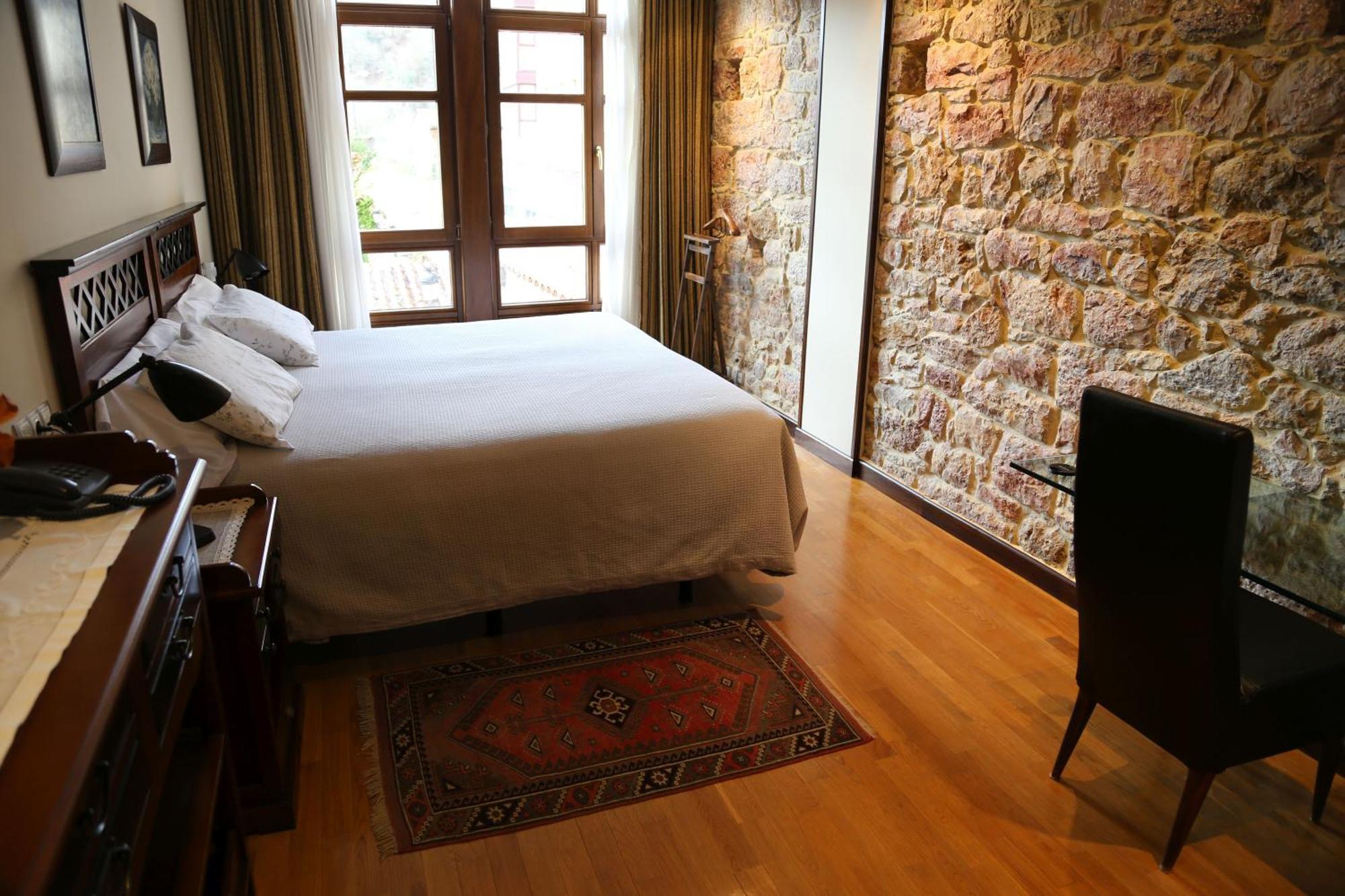 Apartamentos La Pontiga *** อินเฟียสโต ภายนอก รูปภาพ