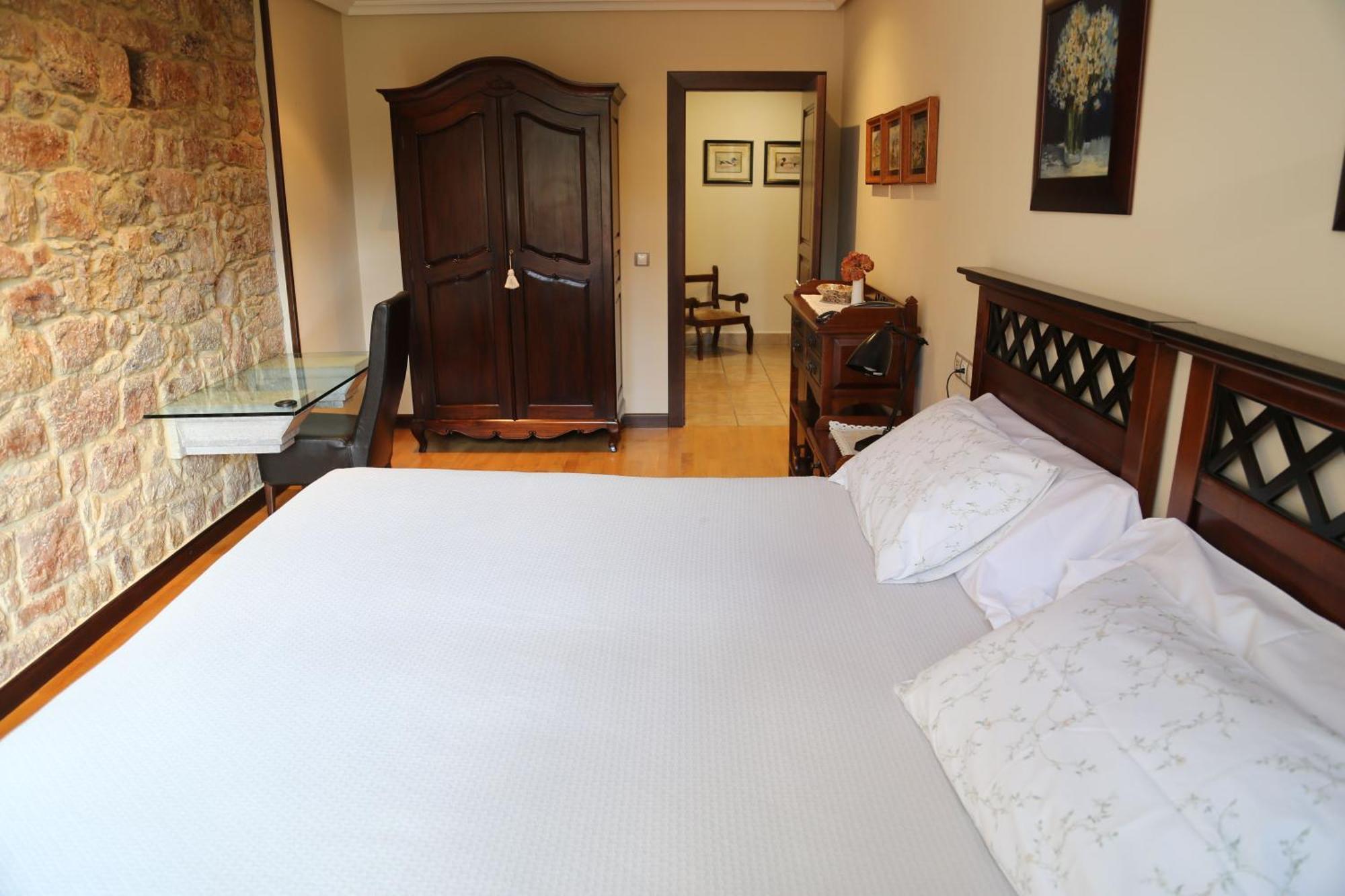Apartamentos La Pontiga *** อินเฟียสโต ภายนอก รูปภาพ
